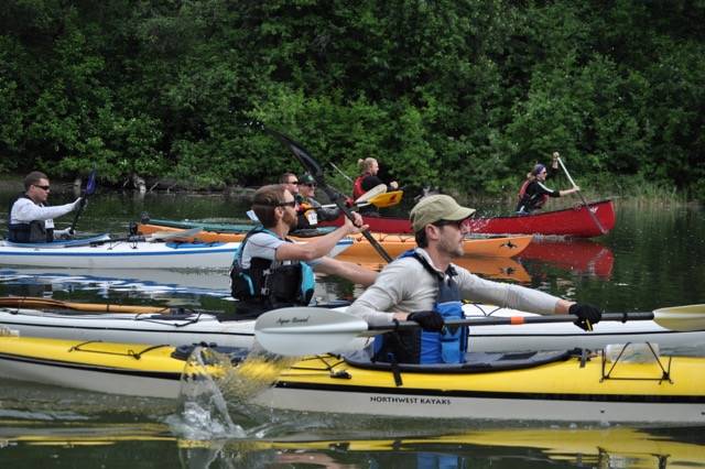 Justin Fantasia, left, and Adam Moser, start the Chilkat Challenge Triathlon on Sunday in Mosquito Lake. (Courtesy Photo | Derek Poinsette)