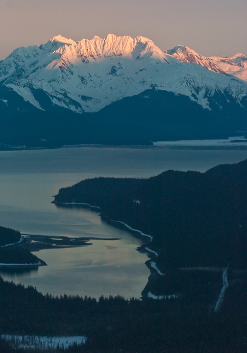 This file photo from 2001 shows Echo Cove, below, and Cascade Point, center, the current end of the road north of Juneau. Lion's Head Mountain is seen at the northern end of Berners Bay is in the background.