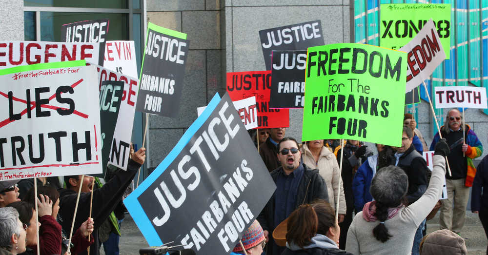 Supporters rally outside the Courthouse during an evidentiary hearing for the Fairbanks Four to try to prove their innocence Monday, Oct. 5, 2015 at the Rabinowitz Courthouse in Fairbanks, Alaska. The Four, George Frese, Kevin Pease, Eugene Vent and Marvin Roberts were convicted in the killing of 15-year old John Hartman 18 years ago. Roberts was released on parole this summer, the other three men remain in jail. (Eric Engman/Fairbanks Daily News-Miner via AP)