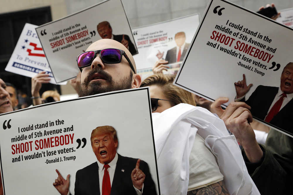 Protesters, organized by The Brady Campaign to Prevent Gun Violence, stage a "die-in" in front of Trump Tower, the residence of Republican presidential candidate Donald Trump, on Wednesday in New York.