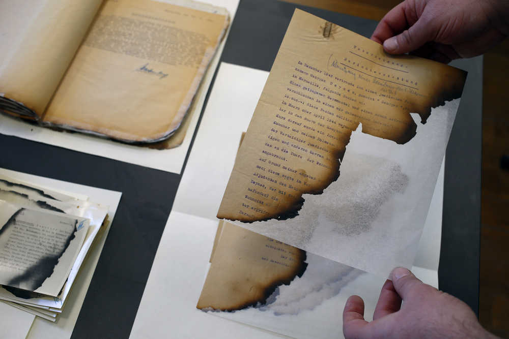 The files of the Gestapo, partially burnt in a blaze in Marseille, and stored for years in the archives rooms of the medieval castle of Vincennes, are on Wednesday.