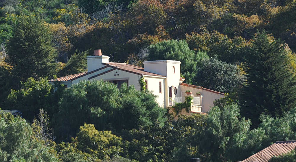 This Thursday photo shows a home on Greenhill Way between Santa Barbara and Goleta, California, where deputies discovered the remains of three people on Wednesday.