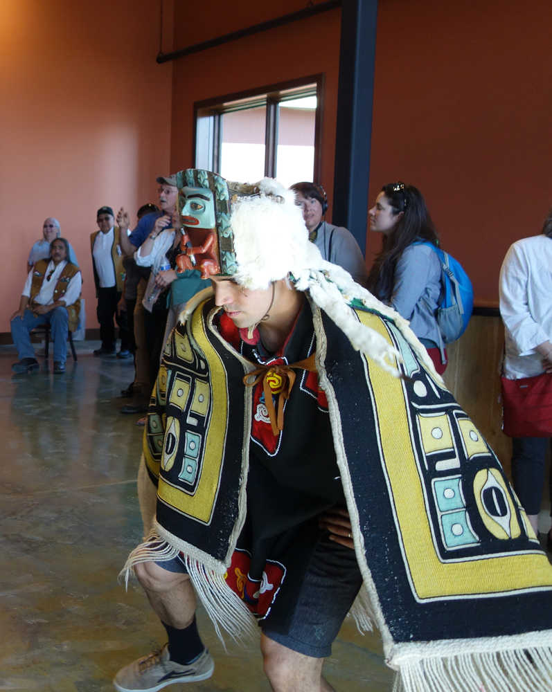 A member of the Geisan Dancers from Haines dances into the Jilkaat Kwaan Cultural Heritage and Bald Eagle Preserve Visitor Center at its grand opening on Saturday, May 14.