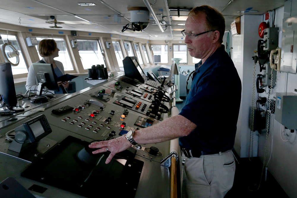 ADVANCE FOR USE SATURDAY, JUNE 25 - In this photo taken June 13, 2016, Doug Russell, the manager of marine operations for the University of Washington's School of Oceanography, stands on the bridge of the research vessel Thomas G. Thompson in Seattle. The ship will be heading into dry dock for a yearlong, $34.5 million overhaul that will be paid for by the U.S. government and extend its life by another 25 to 30 years. (Johnny Andrews/The Seattle Times via AP)