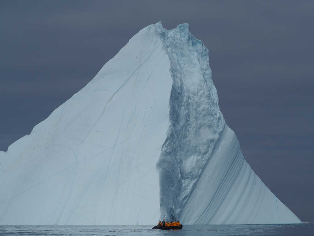 Perspective: more than 80 percent of this iceberg's mass is underwater.  Ilulissat, Greenland.