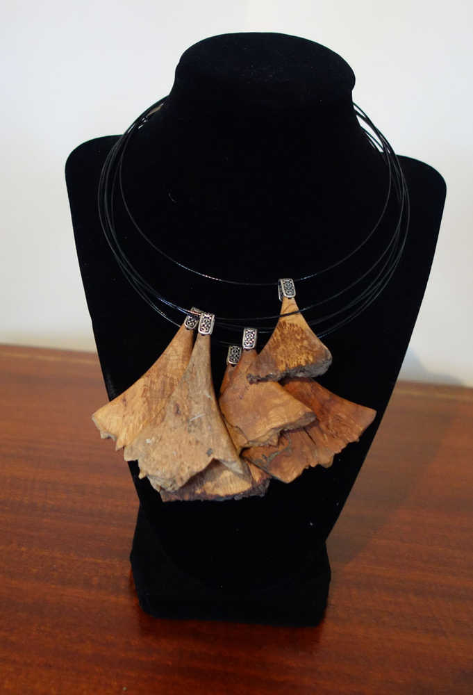 Necklaces made from burl pieces at Rainforest Custom.