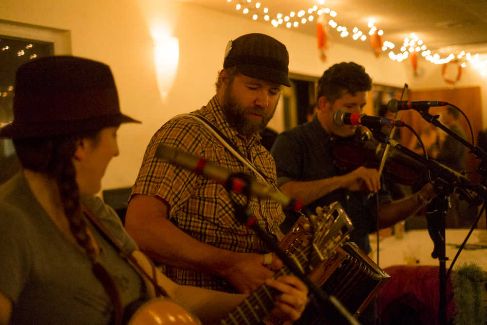 Erin Heist on guitar, Sergei Morosan on accordion, and Andrew Heist on fiddle from the North Country Cajun Club