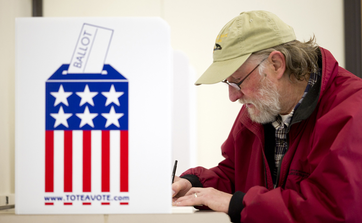 John Hartle takes advantage of early voting at the State Office Building on Monday, Oct. 24, 2016.