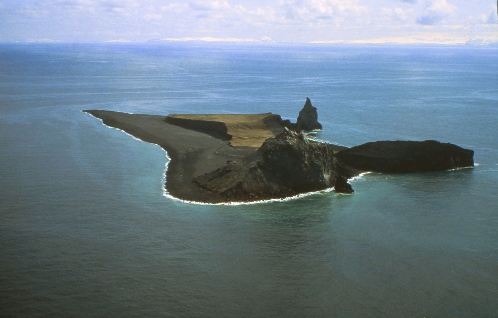 In this May 10, 1994 aerial photo shows the Bogoslof Island looking south. (T. Keith | Alaska Volcano Observatory/U.S. Geological Survey File)