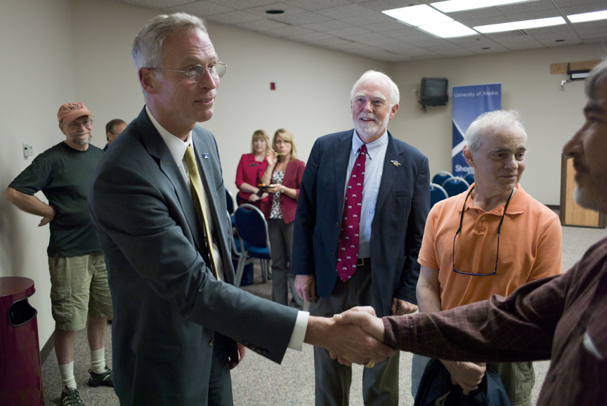 In this July 7, 2015 file photo, Jim Johnsen is greeted at Centennial Hall after recently being officially named president of the University of Alaska system. (Michael Penn | Juneau Empire File)