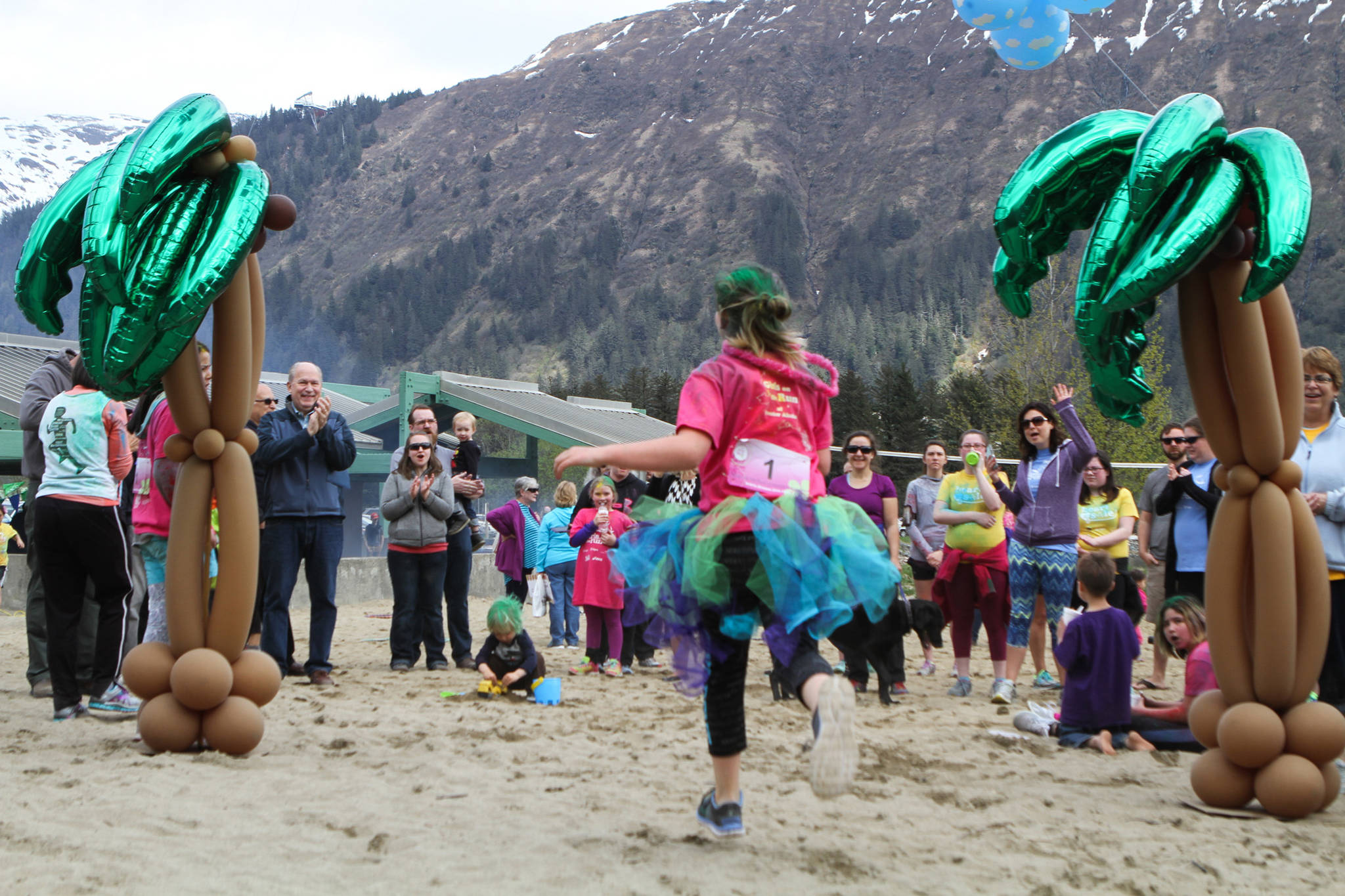 A racer finishes the Girls on the Run 5K on May 6. (Photo courtesy of Seanna O’Sullivan Photography)