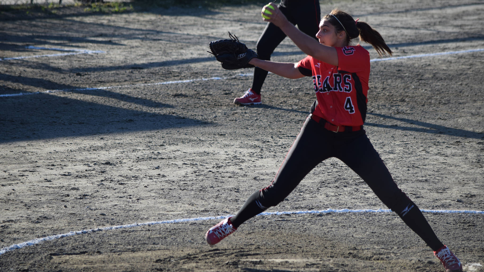 Juneau-Douglas High School’s Leah Spargo pitches against Thunder Mountain in the Region V softball tournament Friday night at Melvin Park. (Nolin Ainsworth | Juneau Empire)