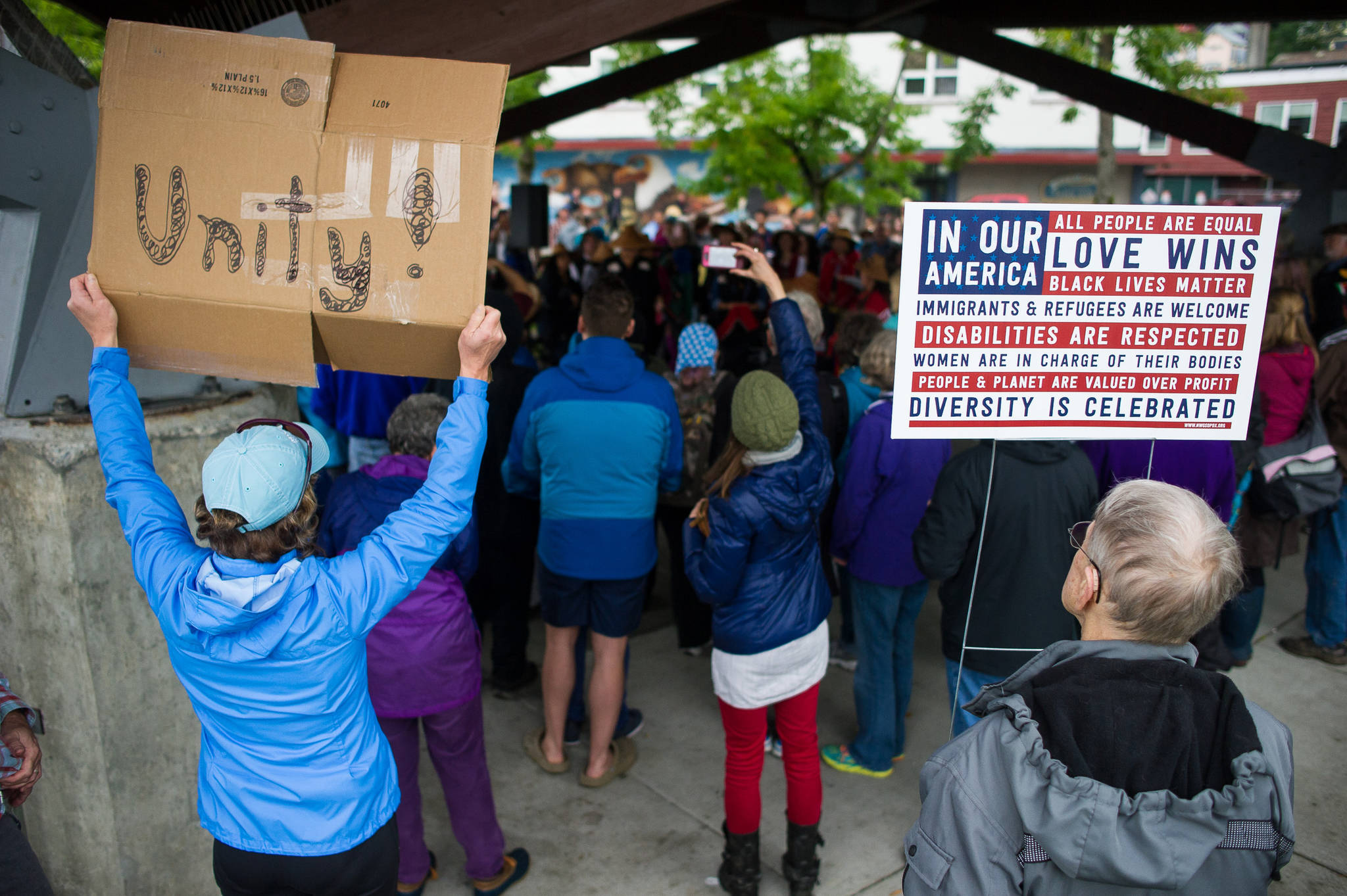 Hundreds attend a Unity Rally against recent racial violence in Charlottesville at Marine Park on Sunday, August 27, 2017.