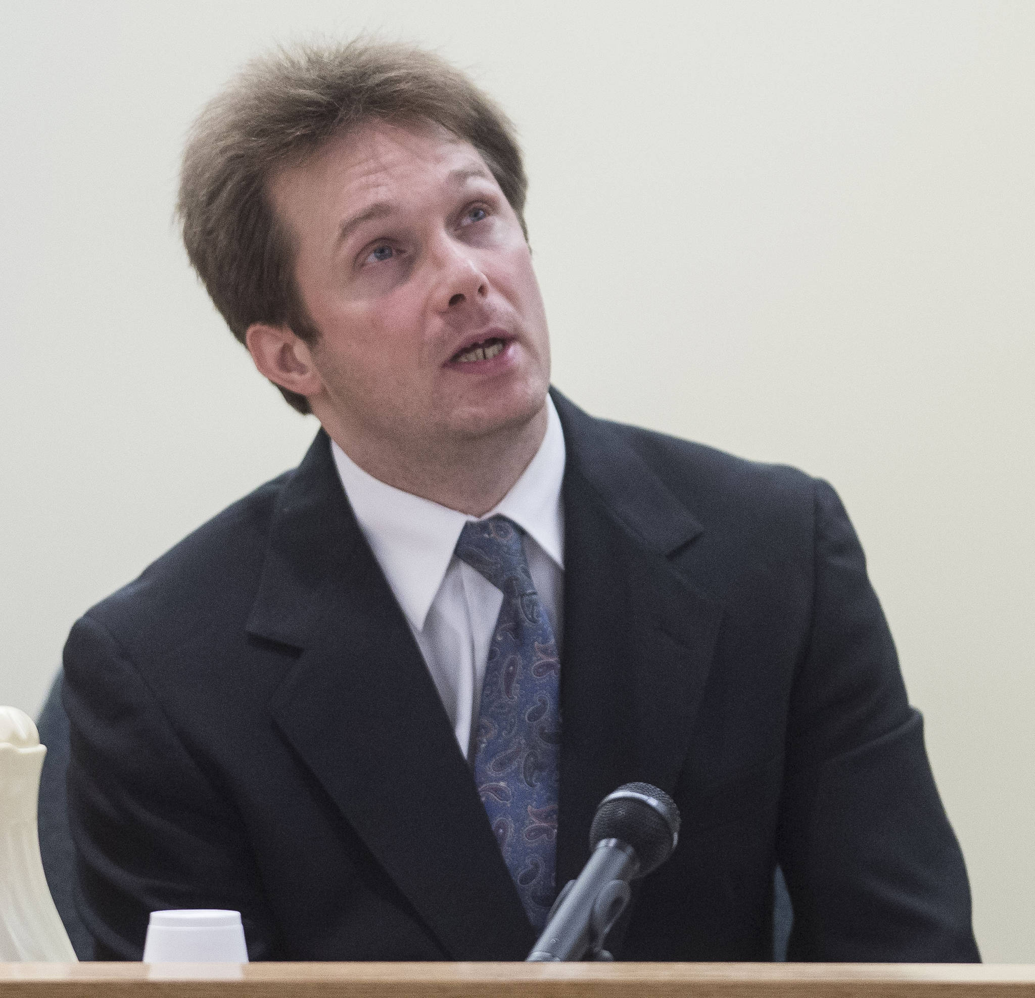 Christopher Strawn takes to the witness chair to testify on his own behalf in Juneau Superior Court on Tuesday, Oct. 17, 2017. Strawn, 34, faces charges of first-degree and second-degree murder, manslaughter, criminally negligent homicide, third-degree assault and weapons misconduct in the shooting death of Brandon Cook in October 2015. (Michael Penn | Juneau Empire)