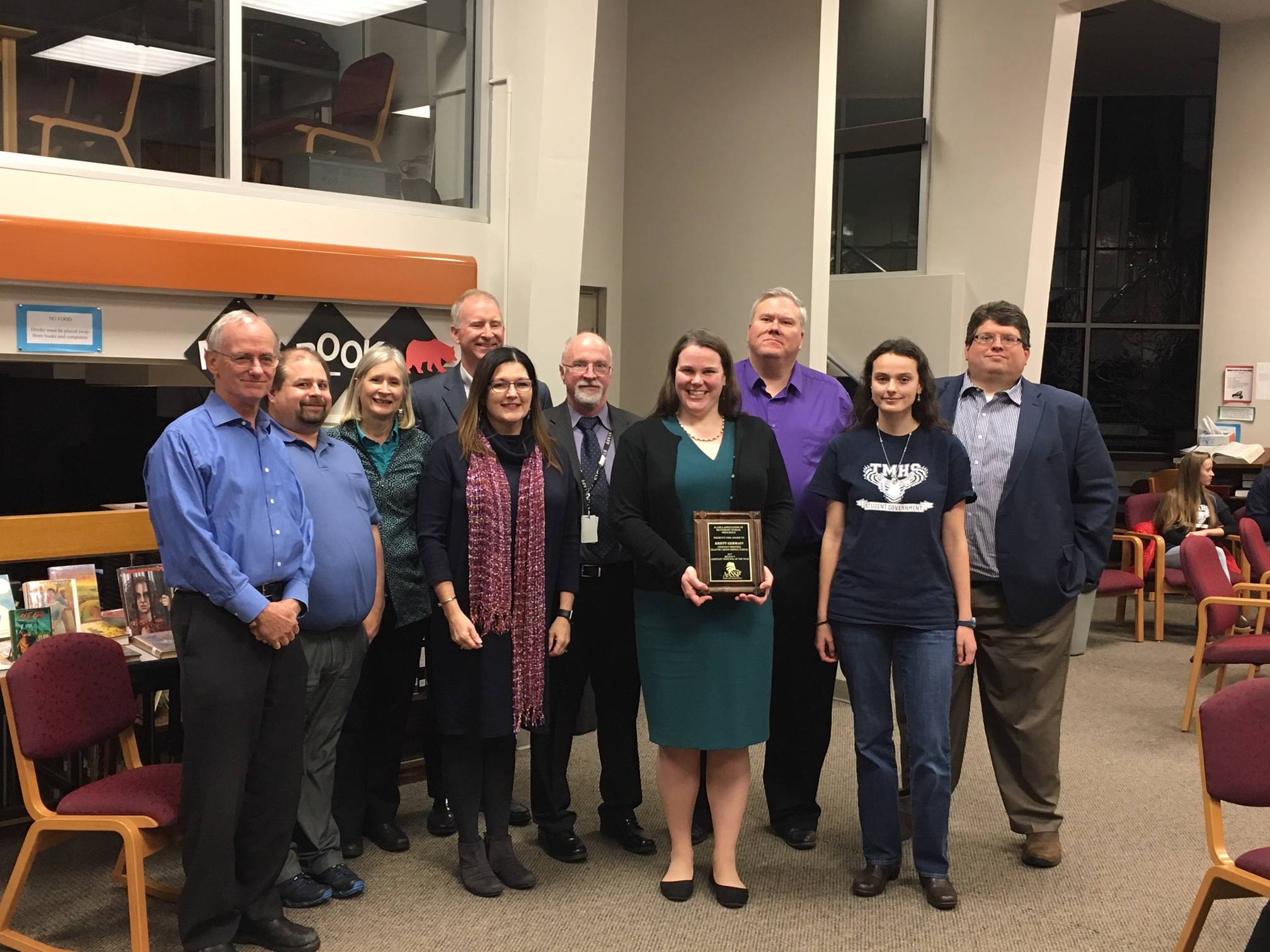 The Juneau School District Board of Education honors Dzantik’i Heeni Middle School Principal Kristy Germain (center right) as she received an award for Assistant Principal of the Year presented by Dr. Lisa Skiles Parady, Executive Director of the Alaska Council of School Administrators (center left). (Courtesy photo | Juneau School District)