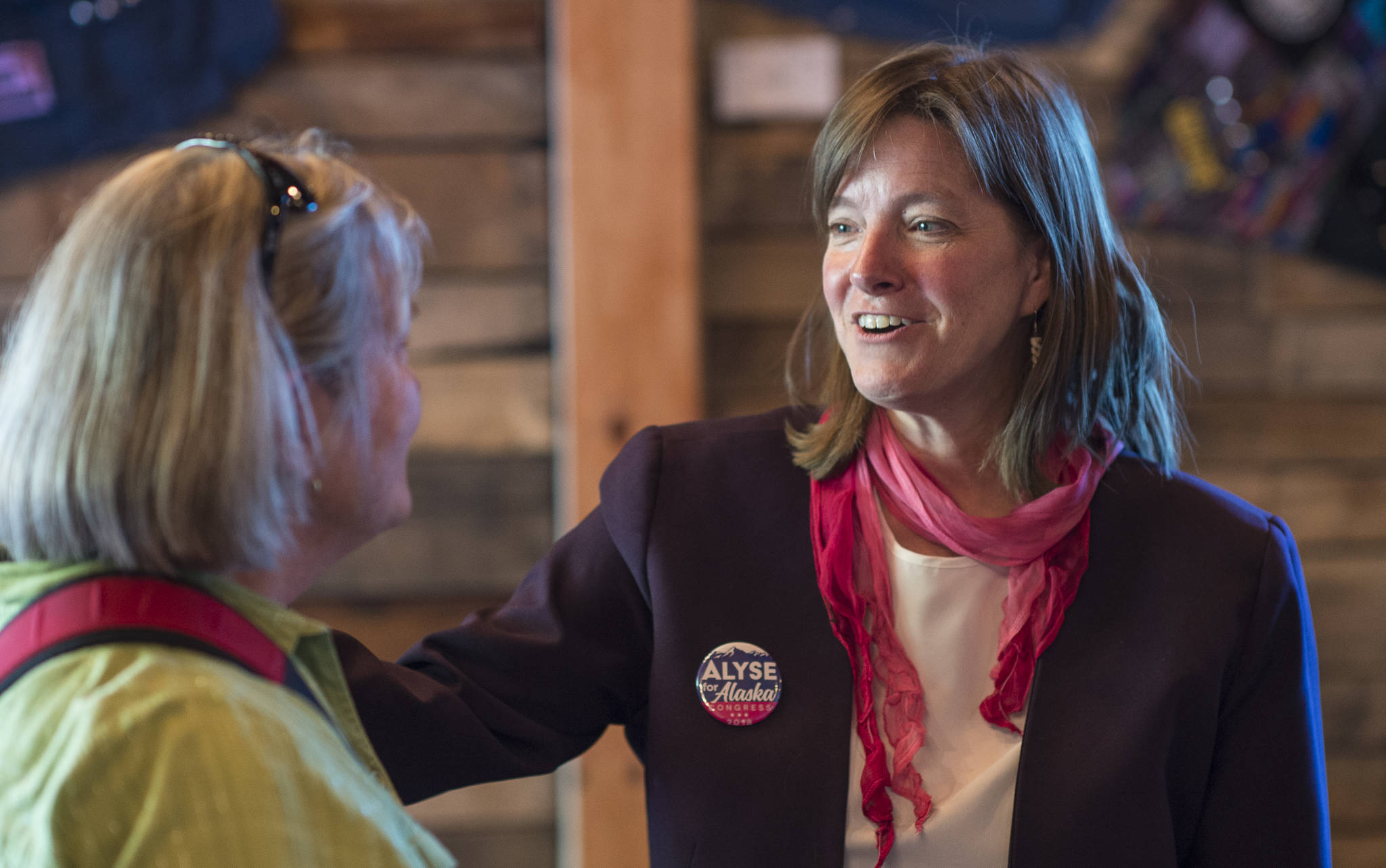 Alyse Galvin, indpendent candidate for U.S. House of Representatives, right, speaks with Marilyn Orr during a “town-hall-style coffee and conversation” at 60 Degrees North Coffee and Tea on Friday, Sept. 14, 2018. Galvin is running against Republican incumbent Rep. Don Young. (Michael Penn | Juneau Empire)