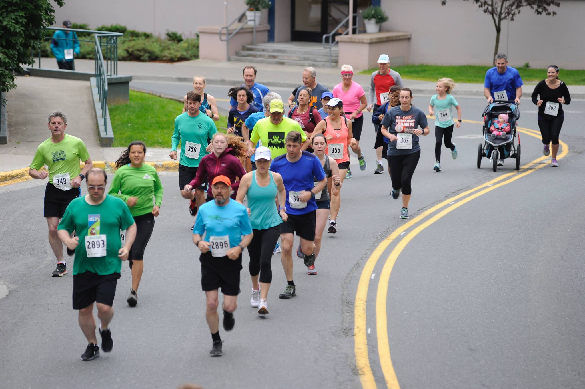 Runners race along Calhoun Avenue for the Juneau Physical Therapy Governor’s Cup 5K and Kid’s 1 Mile last July. (Nolin Ainsworth | Juneau Empire File)