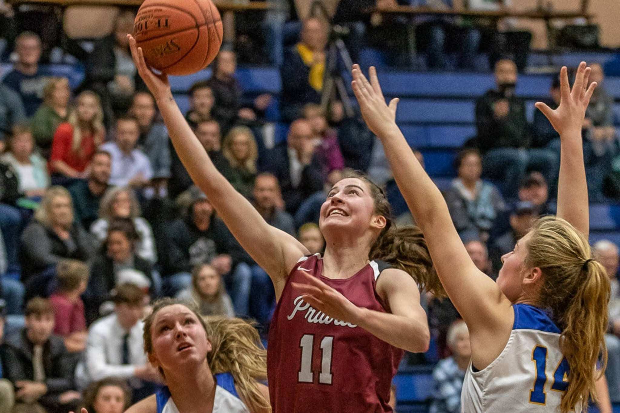 Prairie High School junior Kendyl Carson drives to the basket during a game against Kelso High School in Kelso, Washington, on Dec. 20, 2018. Carson and the Falcons won the Class 3A state girls basketball tournament earlier this month. Carson left Juneau two years ago to pursue her basketball dreams in Washington, but said she’s gearing up to come home to play her senior season at Juneau-Douglas High School. (Mike Schultz | Clark County Today)