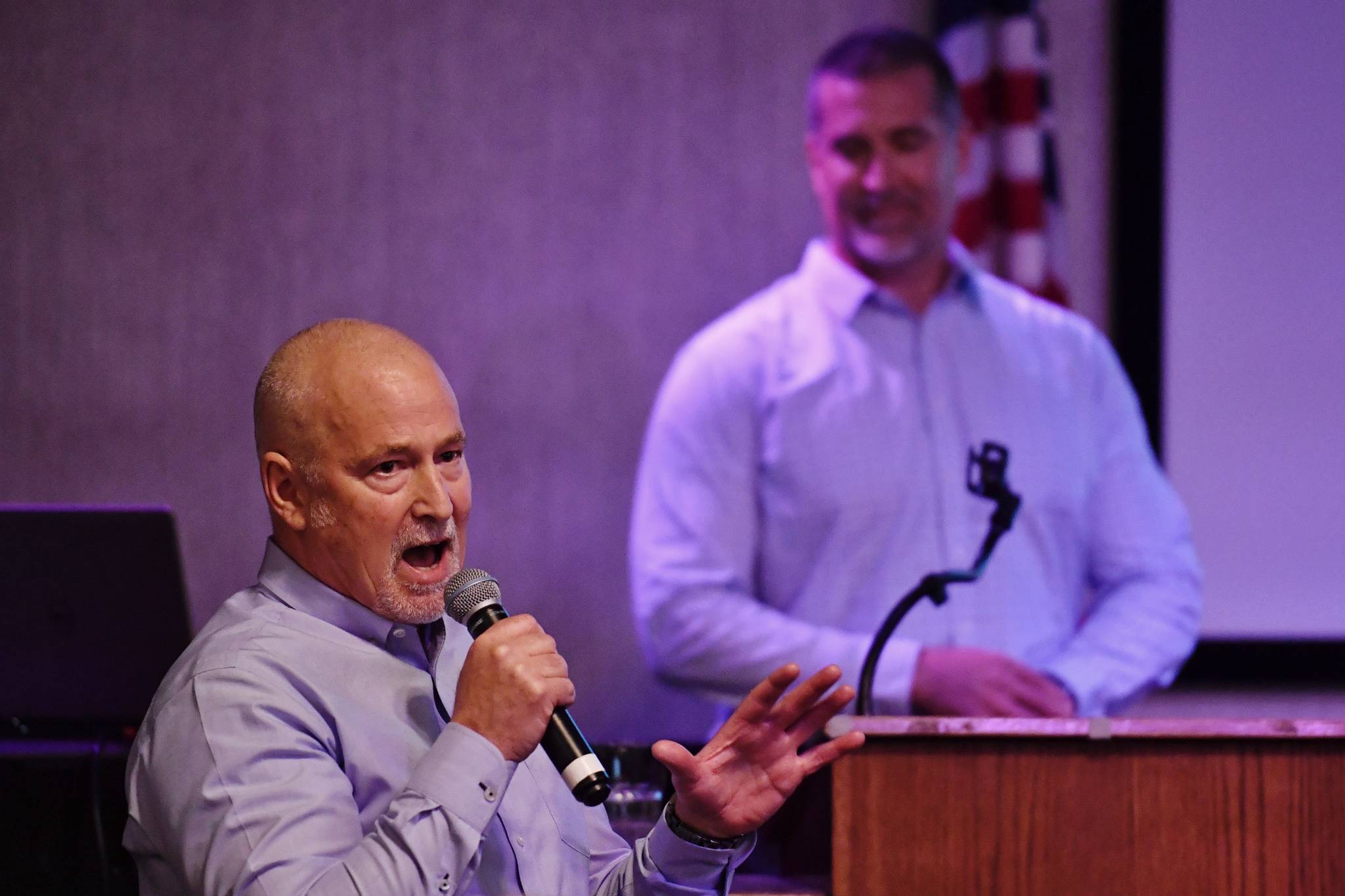 Kevin Anderson, President of Alaska Marine Lines, left, and Vice President Jake Maenpa make a presentation to the Juneau Chamber of Commerce during its weekly luncheon at the Hangar Ballroom on Thursday, April 18, 2019. (Michael Penn | Juneau Empire)