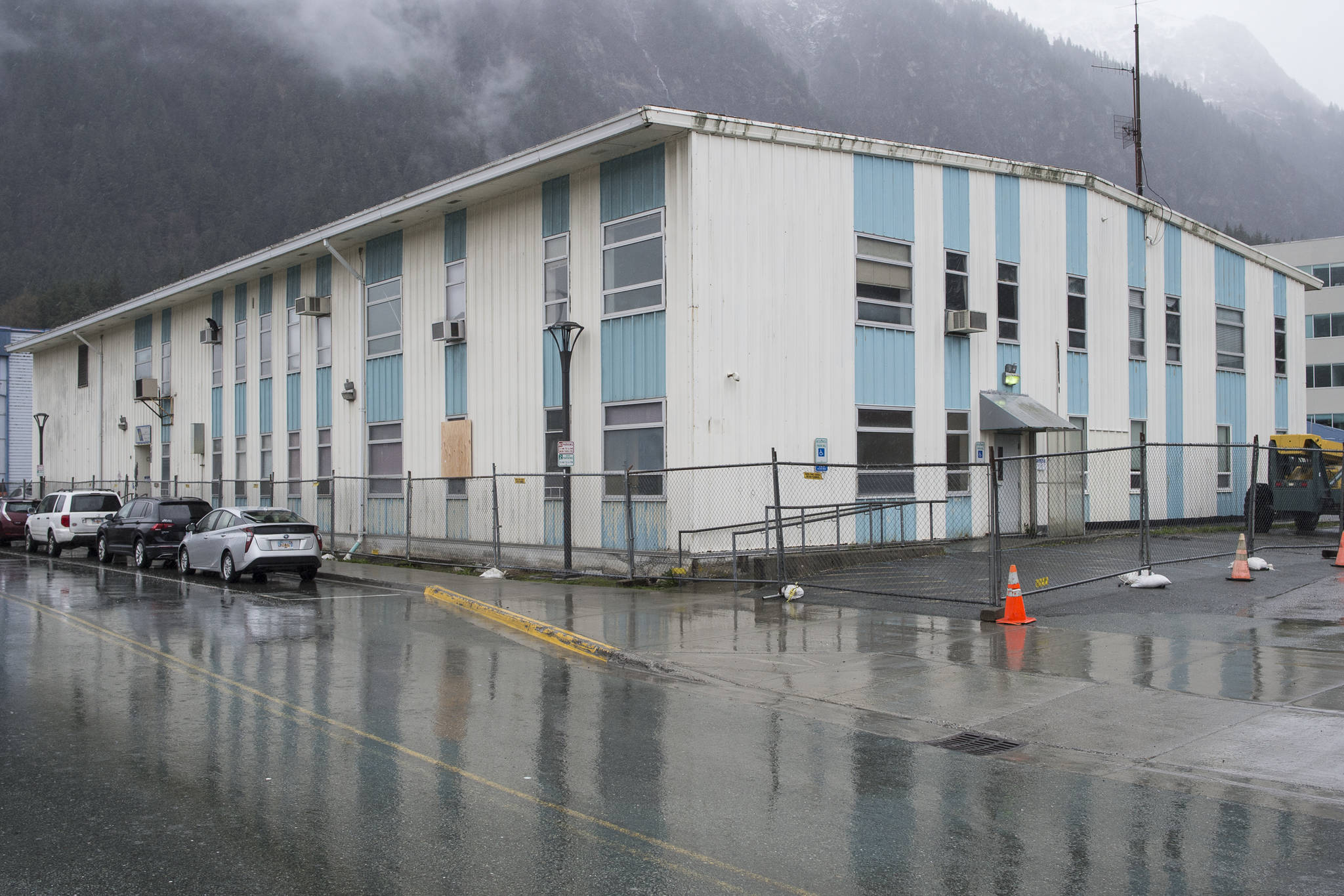 The former Public Safety Building is been fenced off for demolition on Thursday, April 18, 2019. (Michael Penn | Juneau Empire)