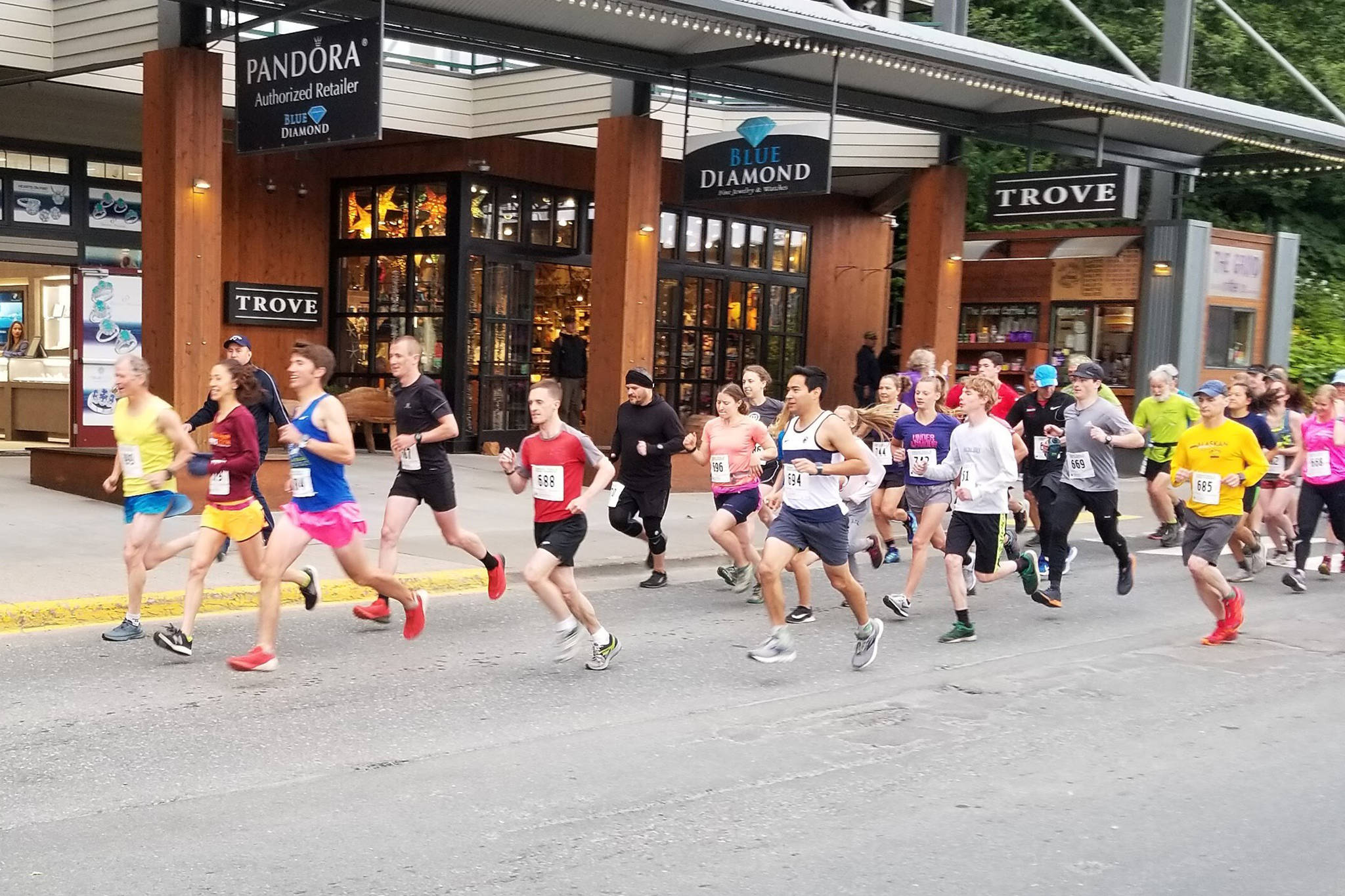 Courtesy Photo | <strong>Myron Davis</strong>                                Close to 50 runners begin the Mount Roberts Tram Run on Saturday. Allan Spangler, third from right, won the race.