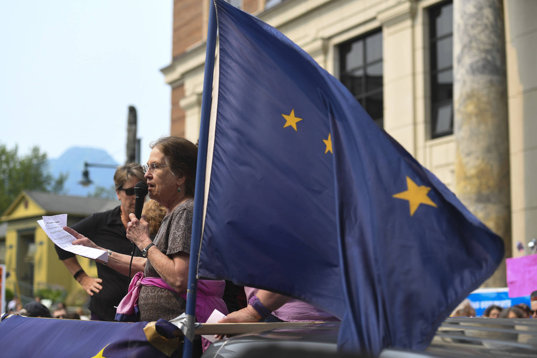 Hundreds attend a rally in front of the Capitol calling for an override of Gov. Mike Dunleavy’s budget vetoes on the first day of the Second Special Session of the Alaska Legislature in Juneau on Monday, July 8, 2019. (Michael Penn | Juneau Empire)