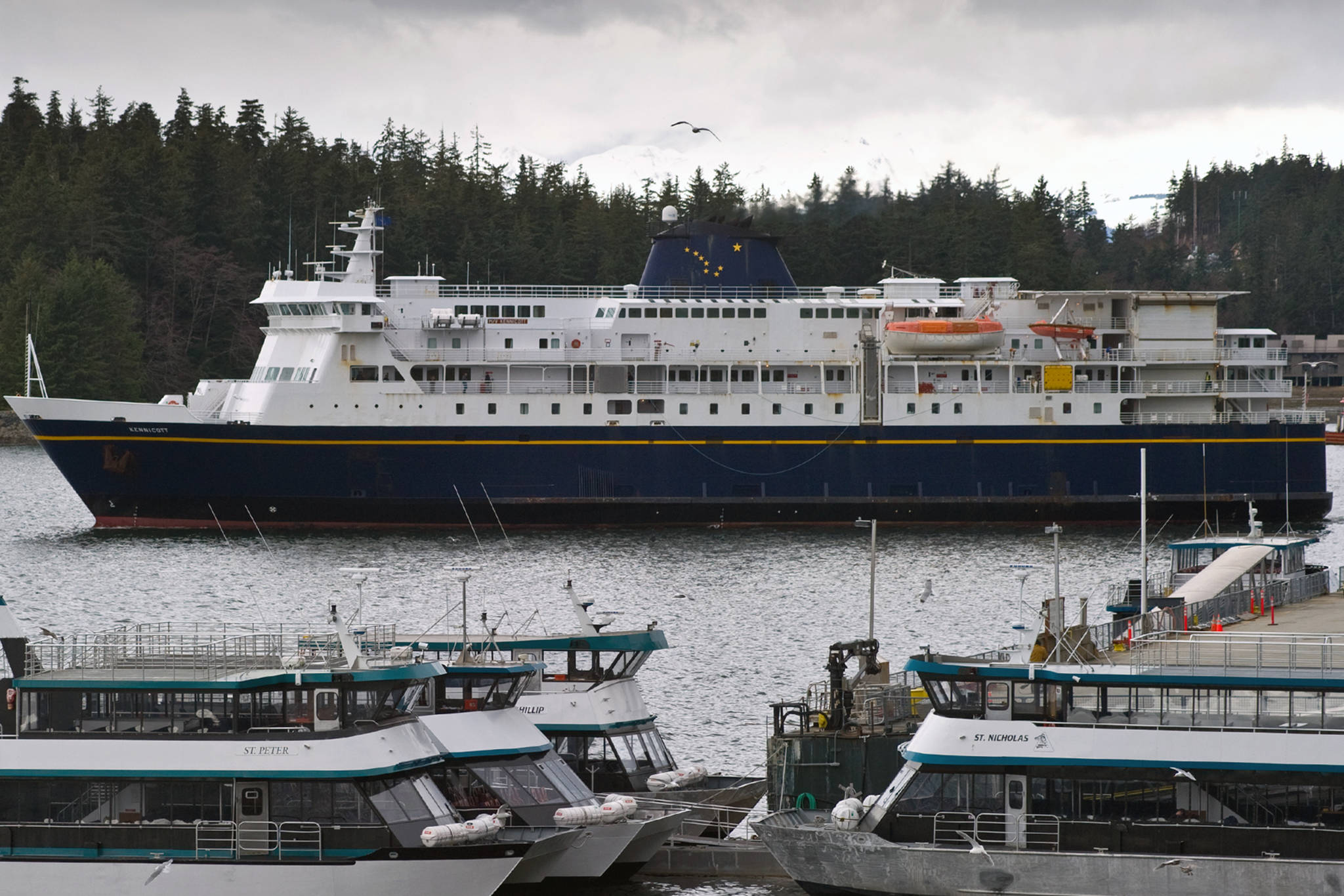 The Alaska Marine Highway System’s M/V Kennicott pulls away from the Auke Bay Ferry Terminal in this August 2014 photo. The Kennicott was the first vessel on the scene to help five Canadians who jumped into the water south of Bella Bella, British Columbia, Canada, to escape a sinking ship. (Michael Penn | Juneau Empire File)