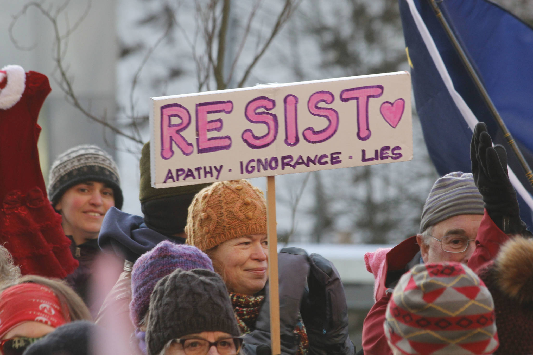 Attendees hold up signs at Juneau’s Women’s March on Saturday, Jan. 19, 2019. (Alex McCarthy | Juneau Empire)