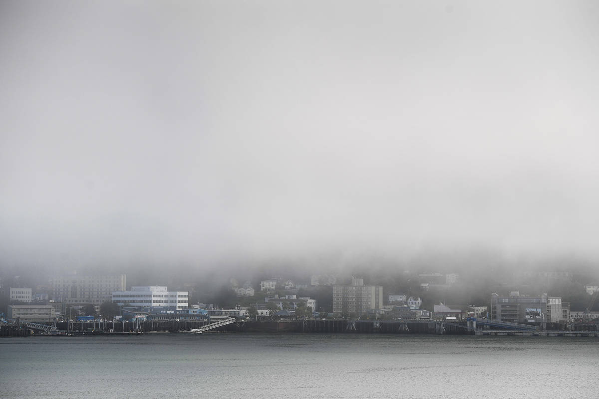 Fog hangs over downtown Juneau on Wednesday, Aug. 28, 2019. (Michael Penn | Juneau Empire File)