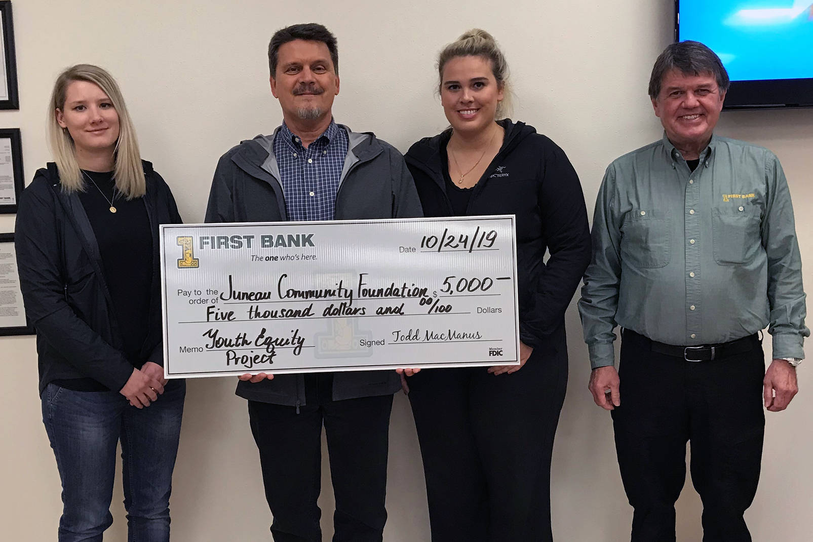 Members of the Juneau Community Foundation receive a donation from First Bank in support of the Youth Equity Project. Pictured from left: Luliia Segal, First Bank, Jamie Waste and Jenna Rutecki, Juneau Community Foundation, and Bob Anderson, First Bank. (Courtesy photo | First Bank)