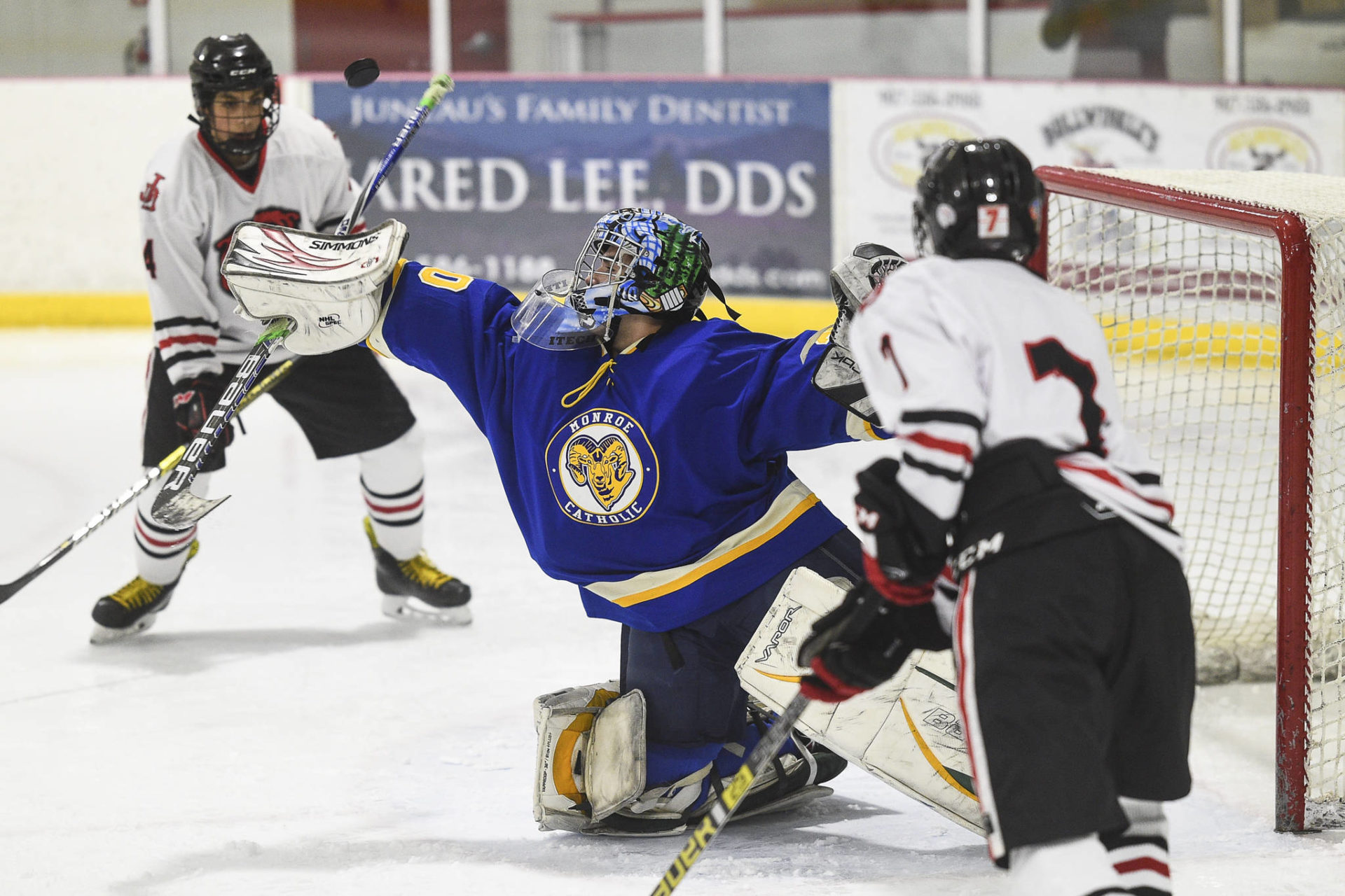 Photos: JDHS hockey shines in home opener | Juneau Empire