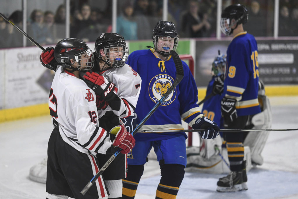 Photos: JDHS hockey shines in home opener | Juneau Empire