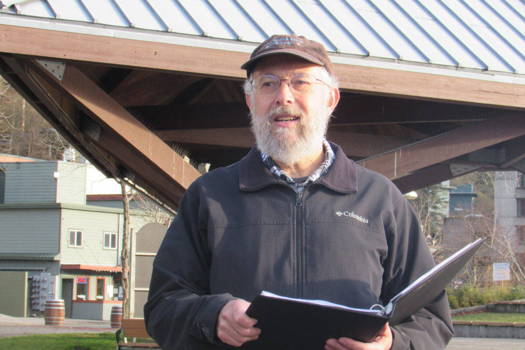 Ed Schoenfeld talks during the Capital City Killers tour that was offered through the Juneau-Douglas City Museum. The tour has now morphed in a series of murder-themed presentations that will be accompanied by desserts at the museum. (Ben Hohenstatt | Juneau Empire File)