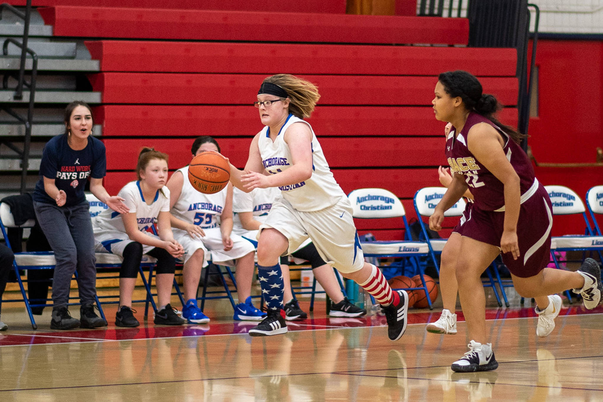 Courtesy Photo | Chris Waythomas                                Coach Karli Brakes, far left, encourages an Anchorage Christian Schools girls basketball player. Brakes played point guard for Juneau-Douglas High School before playing college basketball at two different schools.