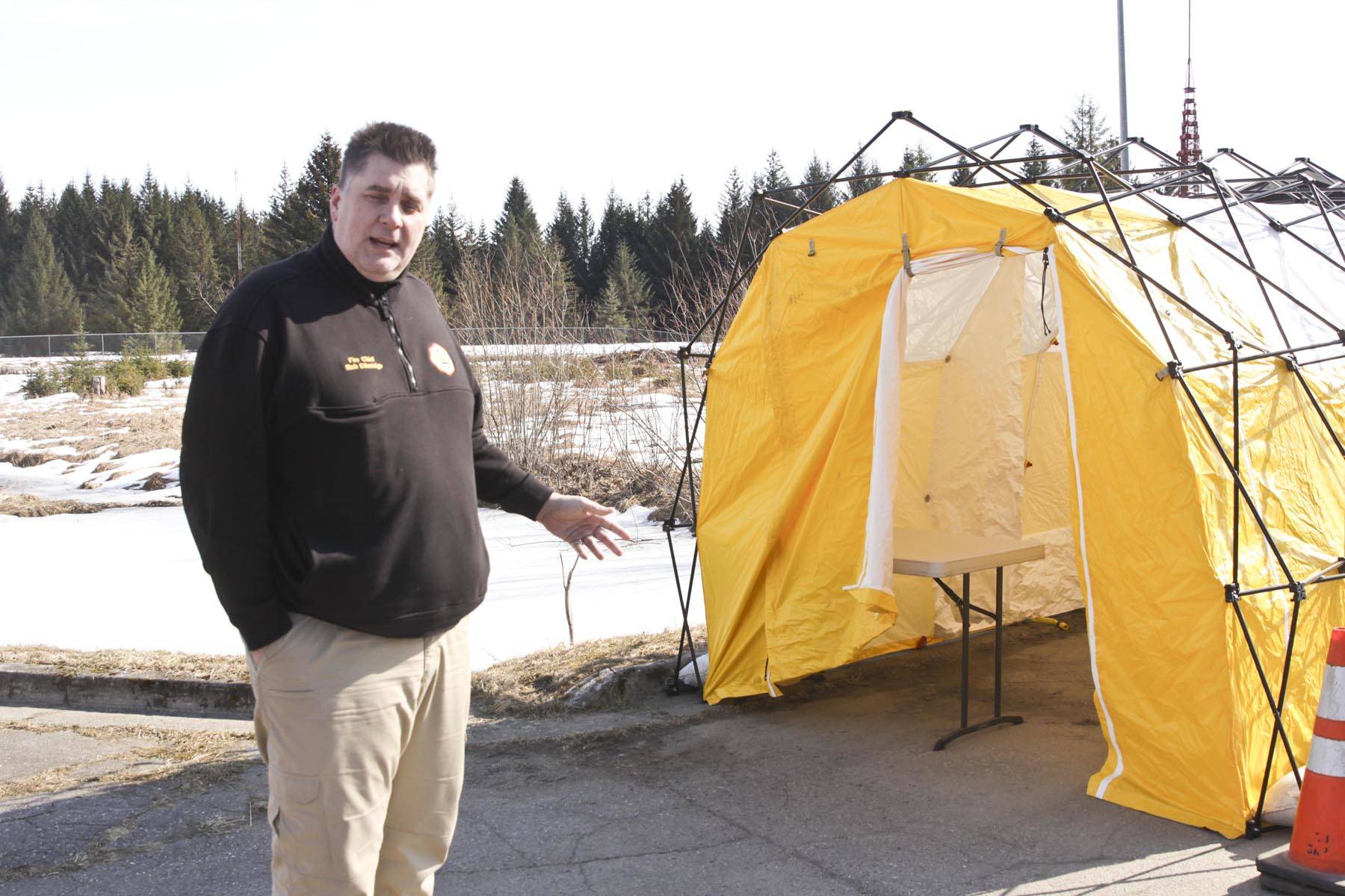 Capital City Fire/Rescue Chief Rich Etheridge talks about the appointment-based drive-thru testing site located at the Hagevig Regional Fire Training Center for people who may have COVID-19, March 24, 2020. (Michael S. Lockett | Juneau Empire)