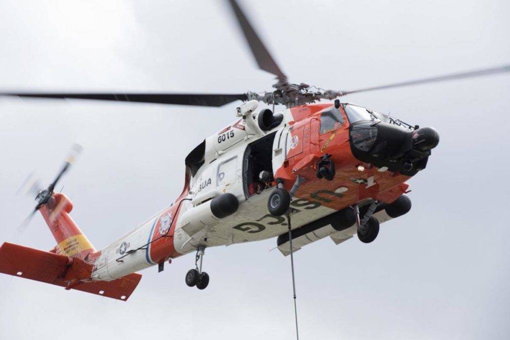 An MH-60 Jayhawk crew from Coast Guard Air Station Sitka carries out training in Juneau, Alaska, June 26, 2018. (Petty Officer 1st Class Jon-Paul Rios | U.S. Coast Guard)