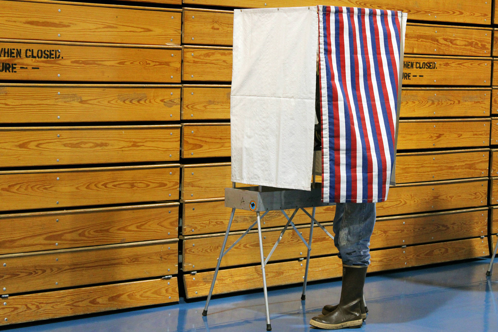 A man votes during the primary election the morning of Tuesday, Aug. 18, 2020. (Ben Hohenstatt / Juneau Empire)