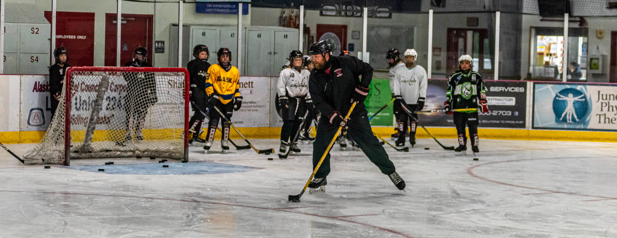 Courtesy Photos / Steve Quinn                                Matt Boline demonstrates a drill during a recent workout with players in the 12-and-under group workout at Treadwell Ice Arena.