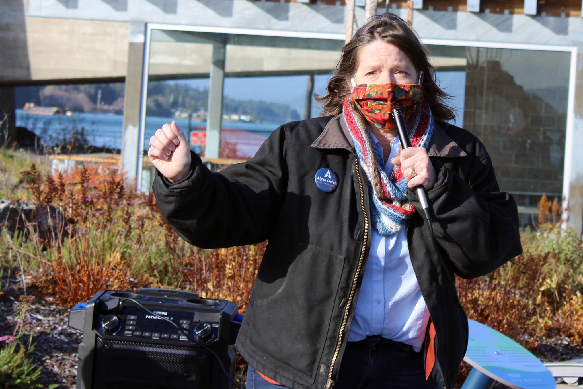 Alyse Galvin, a candidate for the U.S. House of Representatives, speaks during a women's march and rally held Saturday in Juneau. Ben Hohenstatt / Juneau Empire)