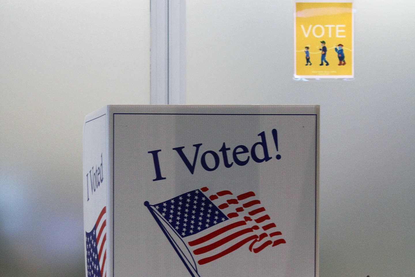 A voter fills out their ballot in person at the Mendenhall Valley Public Library on Oct. 6, 2020. The library was the site of one of the voting centers during the City and Borough of Juneau's by-mail municipal election. (Ben Hohenstatt / Juneau Empire)