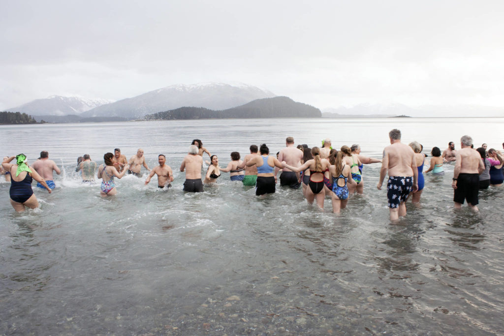 Hundreds wave goodbye to last year, plunge into 2024 during 33rd annual  Juneau Polar Bear Dip