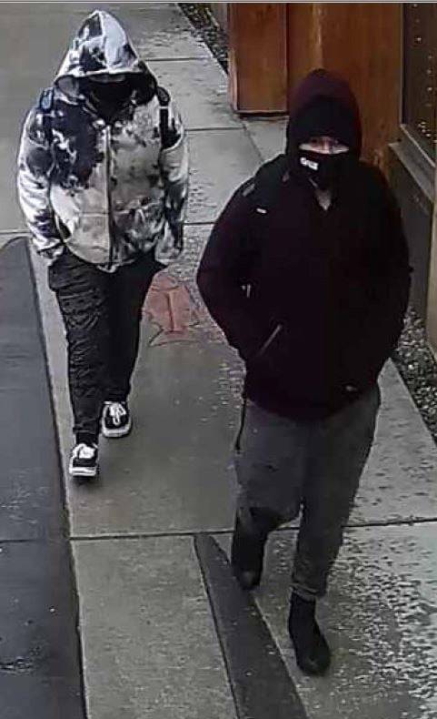 The Juneau Police Department is searching for a man and woman, pictured here in surveillance footage, wanted in connection for a robbery that occurred downtown on April 1, 2021. (Courtesy photo / JPD)