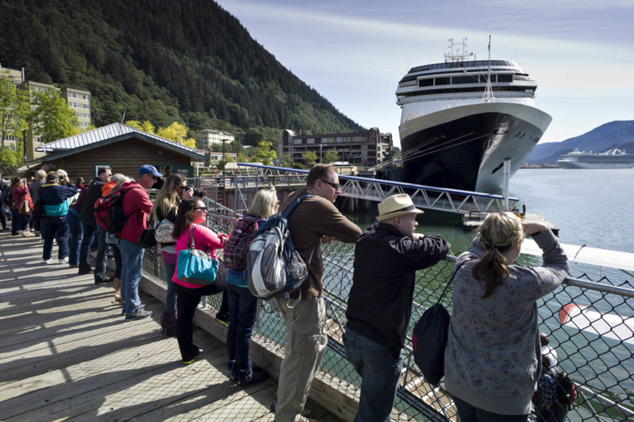 Tourists view Juneau’s downtown harbor in August 2015. (Michael Penn / Juneau Empire File)