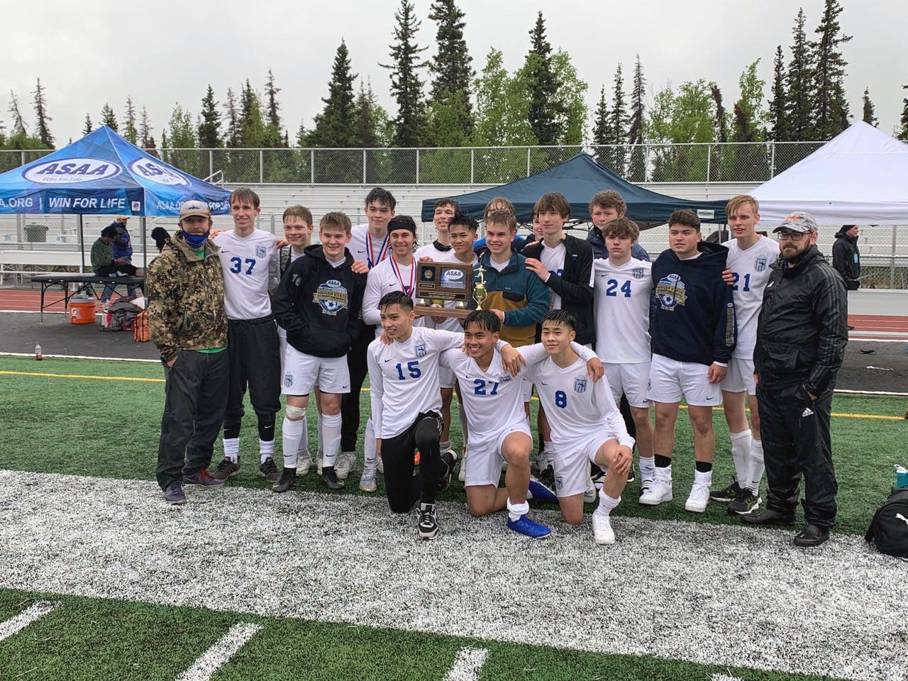 Members of the TMHS boys soccer team celebrate winning the school’s first-ever, state-wide soccer championship besting Soldotna in a hard-fought 3-2 victory on May 29, 2021. (Courtesy Photo/Tim Lewis)