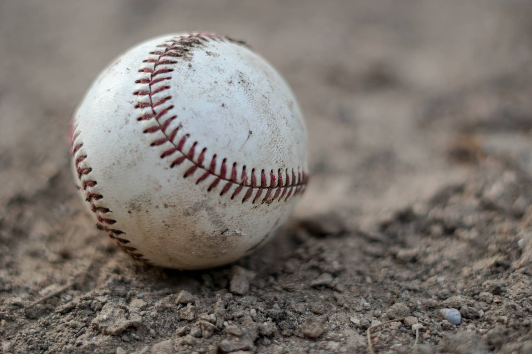 The Juneau-Douglas High School: Yadaa.at Kalé baseball and softball teams will travel to Anchorage this weekend to compete in their respective state tournaments. (Unsplash / Thomas Park)