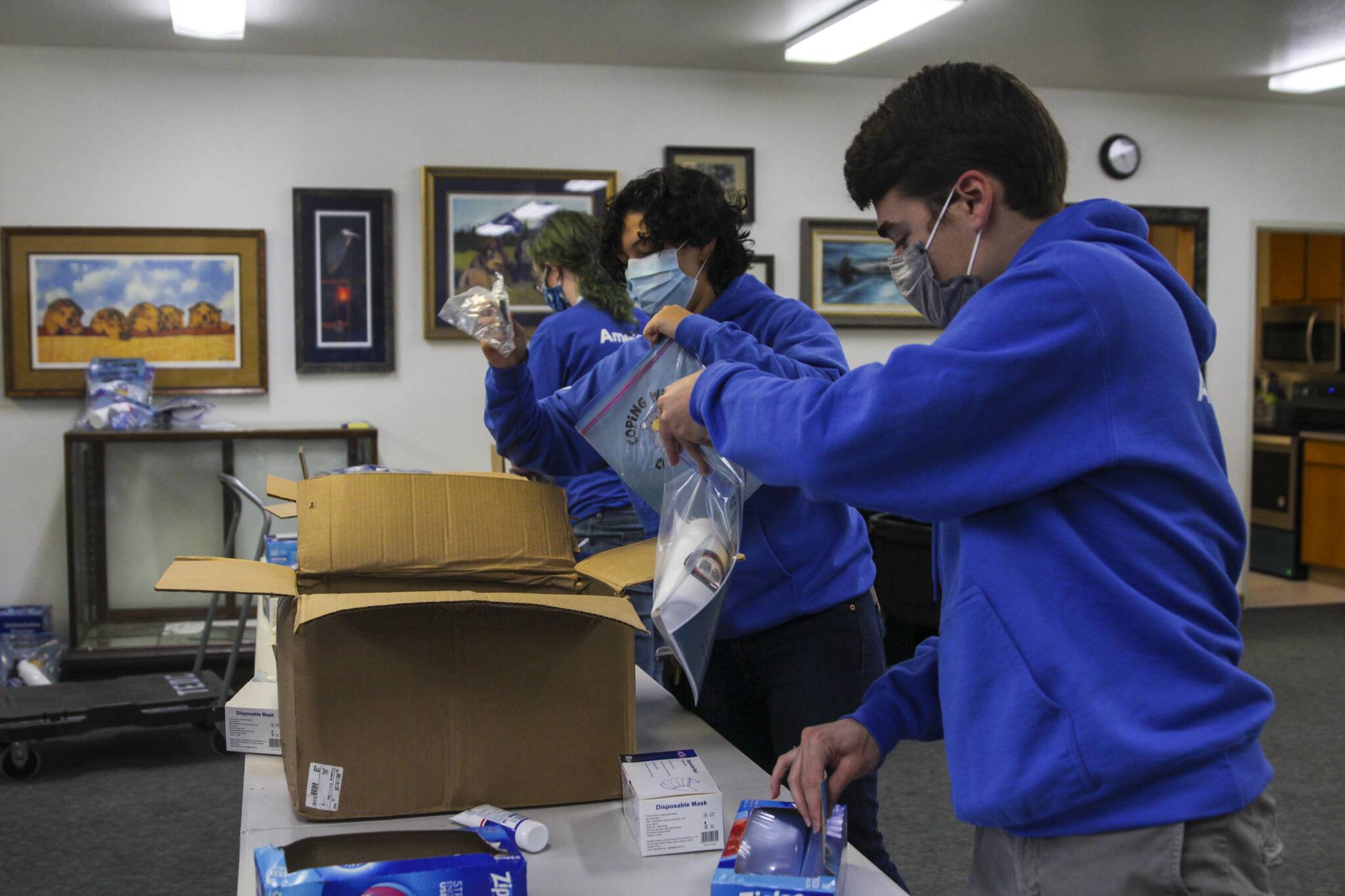 Michael S. Lockett / Juneau Empire 
AmeriCorps members pack emergency preparedness kits for Central Council of Tlingit and Haida Indian Tribes of Alaska’s Tribal Emergency Operations Center as part of a day of service on Sept. 10, 2021.