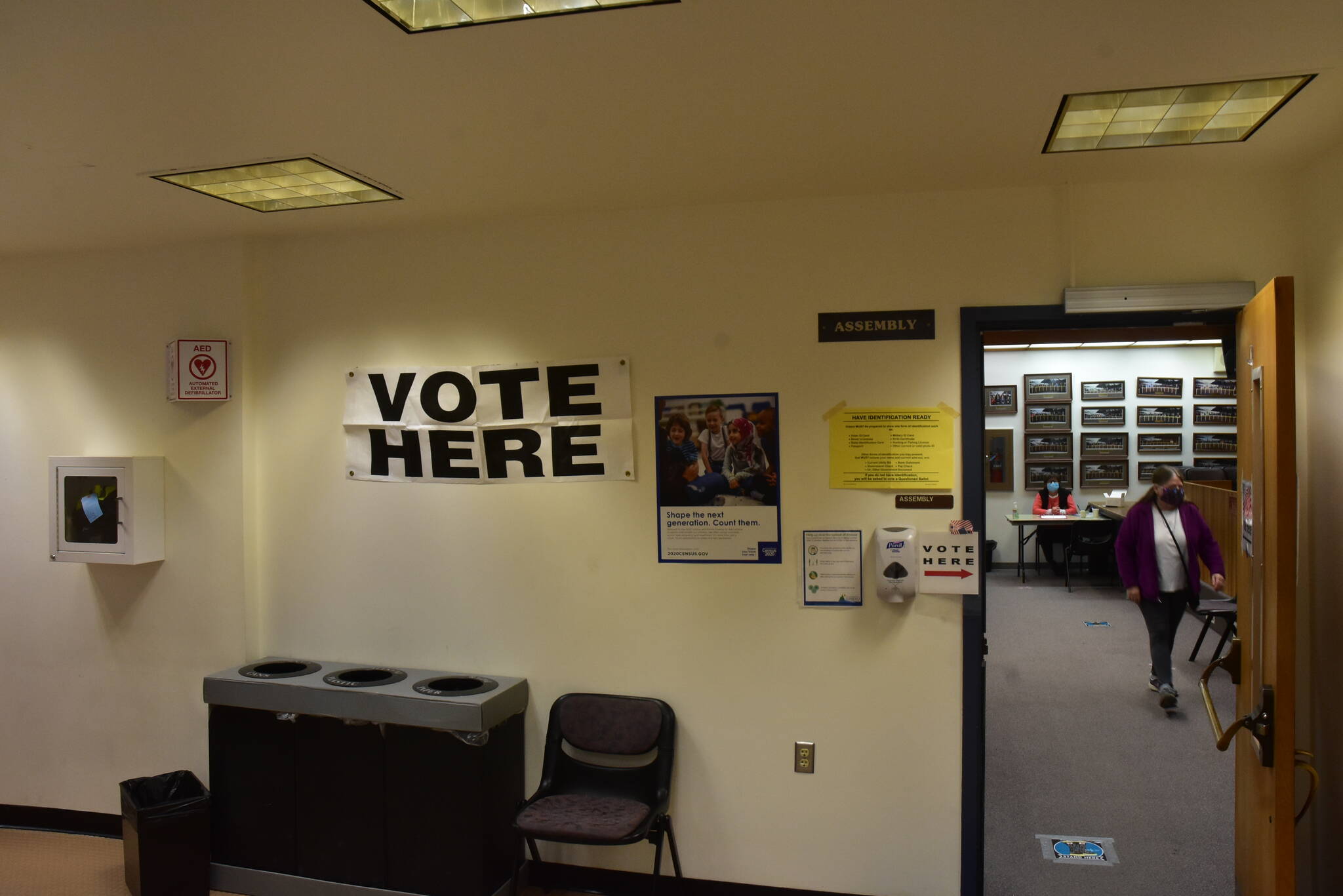 A voter leaves the assembly chambers in City Hall after voting in the Oct. 6, 2020, municipal election, which was primarily conducted via mail. Next month's election will also be conducted mostly by mail with ballots counted in Anchorage. On Monday night, assembly members approved $700,000 to renovate a local warehouse and purchase equipment to count ballots locally. (Ben Hohenstatt / Juneau Empire File)