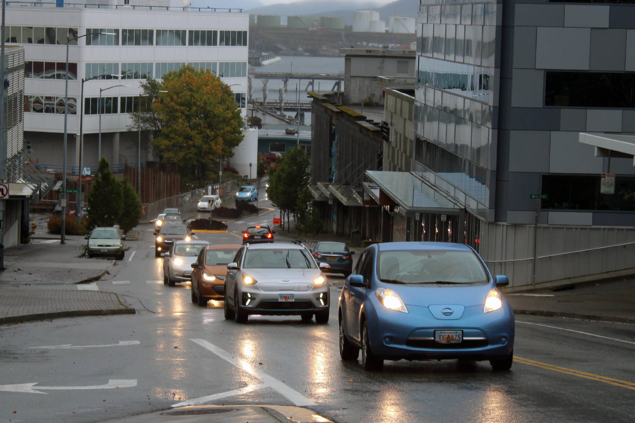 A line of electric vehicles makes its way up Main Street Saturday, Sept. 26, 2020. (Ben Hohenstatt / Juneau Empire File)