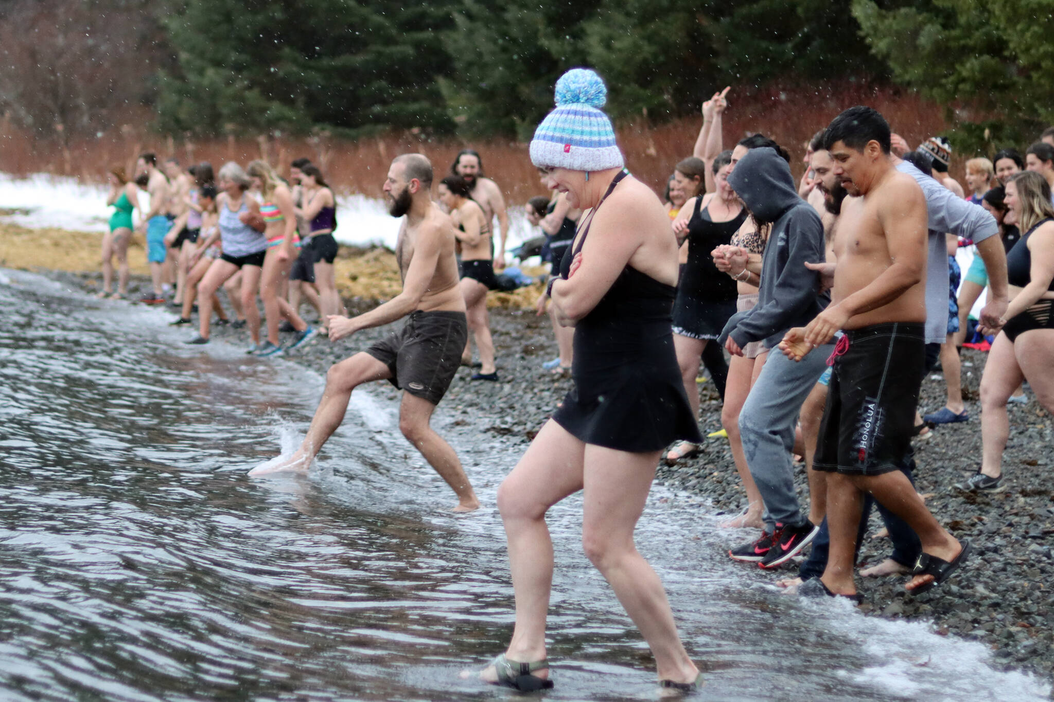 Polar plunge participants around the world kick off 2022 with an icy dip