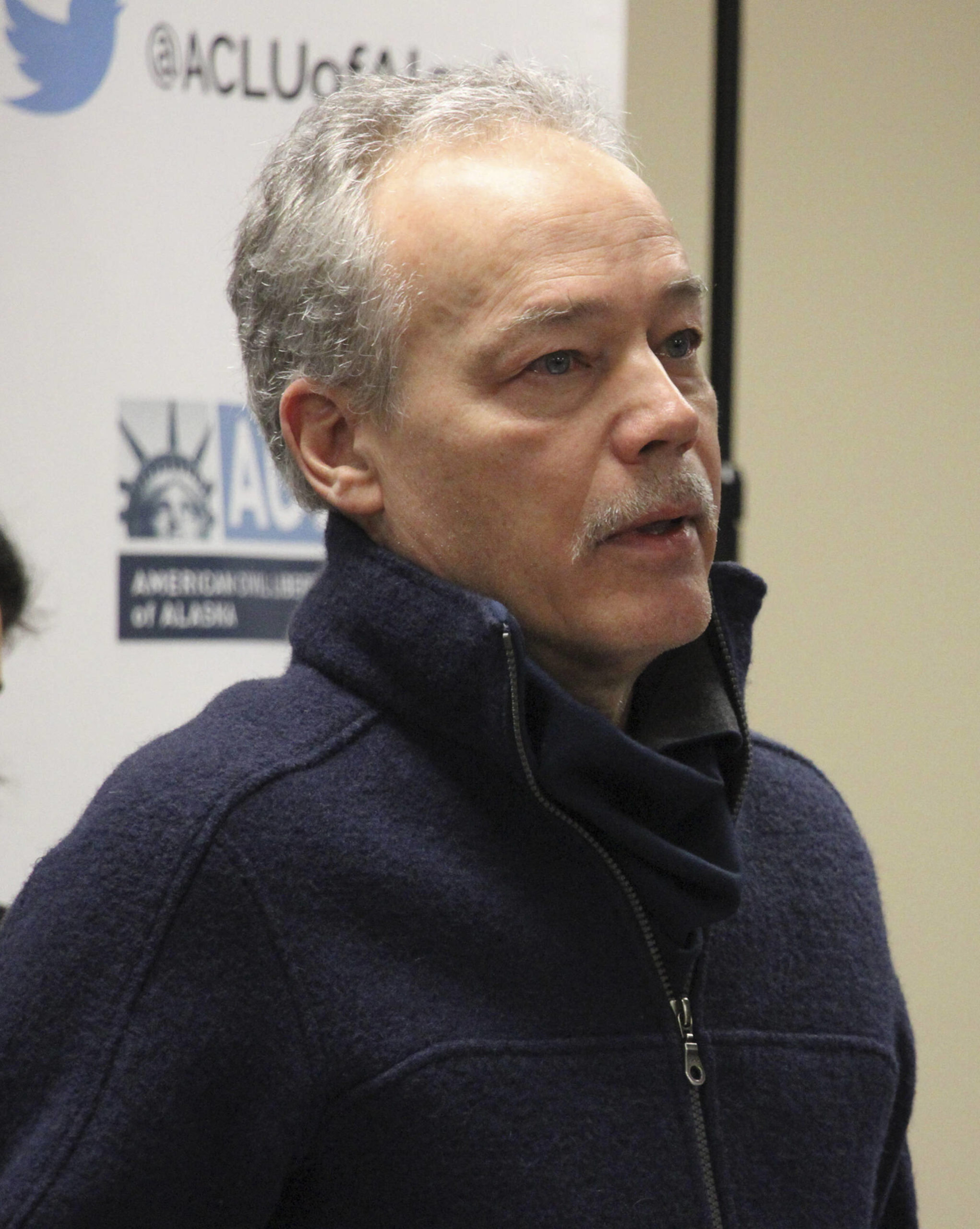 Former Alaska Psychiatric Institute staff psychiatrist Dr. John Bellville speaks during a news conference on Jan. 10, 2019, in Anchorage, Alaska. The state of Alaska has settled a lawsuit with Bellville, who was one of three former state employees who claimed they were wrongfully fired when Alaska Gov. Mike Dunleavy took office. Under the agreement, announced Wednesday Feb. 2, 2022, Bellville will receive $275,000, reflecting lost wages, damages and attorney’s fees. (AP Photo / Mark Thiessen, File)